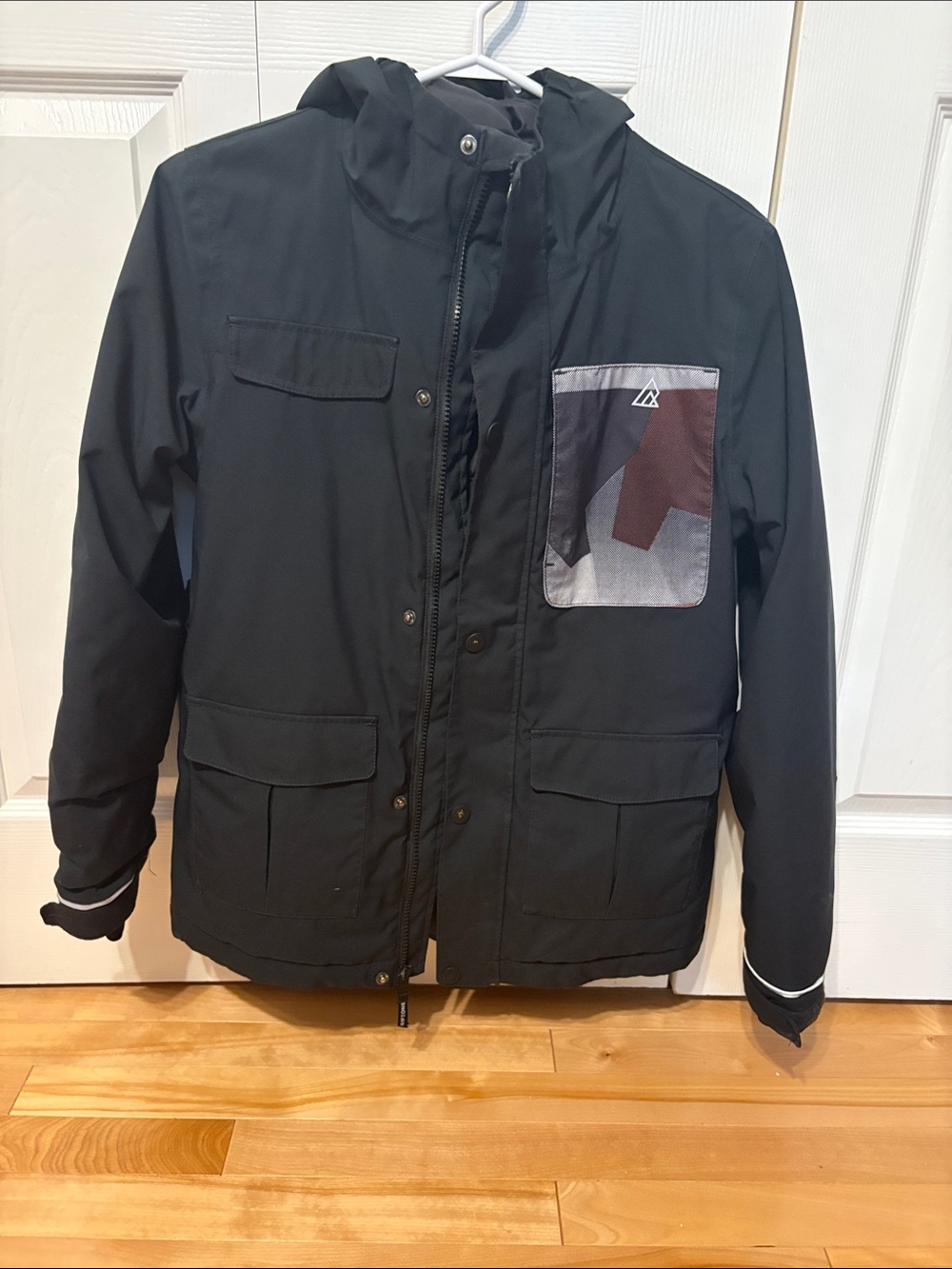 Boy’s Black Hooded Winter Jacket with Contrast Chest Pocket